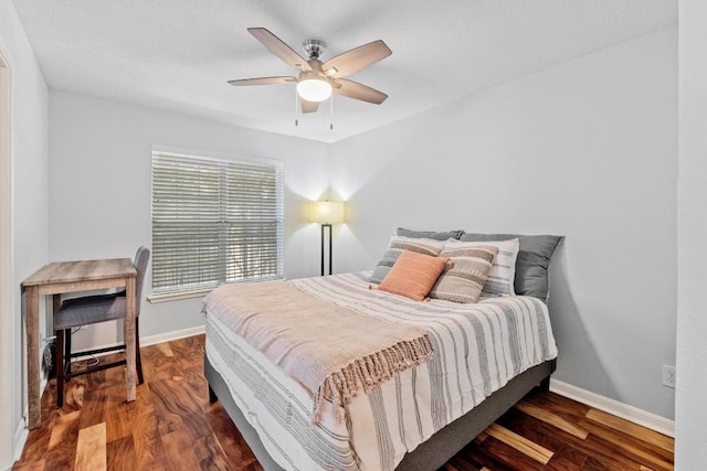 7685 Northcross Dr Unit 720, Austin, TX 78757 - bedroom featuring wood finished floors and ceiling fan