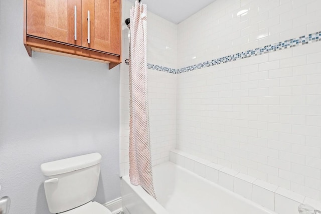7685 Northcross Dr Unit 720, Austin, TX 78757 - bathroom featuring toilet and shower / bath combination with curtain