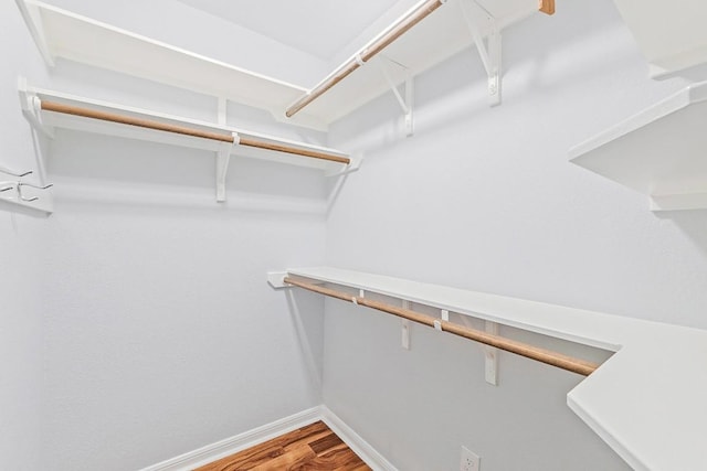 7685 Northcross Dr Unit 720, Austin, TX 78757 - spacious closet featuring wood finished floors