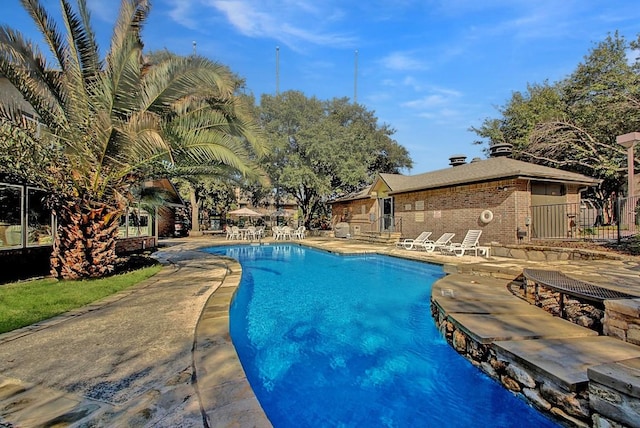 7685 Northcross Dr Unit 720, Austin, TX 78757 - community pool with a patio