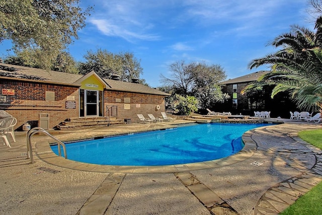 7685 Northcross Dr Unit 720, Austin, TX 78757 - community pool with a patio area