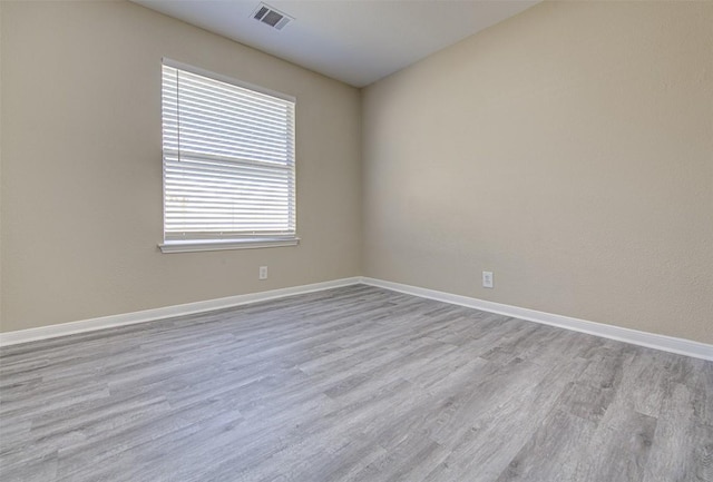 430 Zebra Dr, Kyle, TX 78640 - spare room featuring wood finished floors