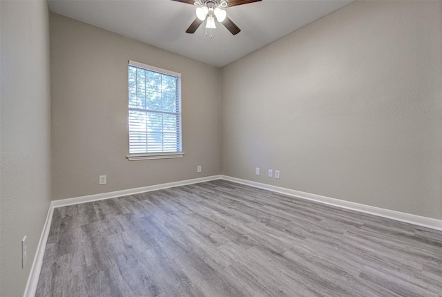 430 Zebra Dr, Kyle, TX 78640 - unfurnished room featuring wood finished floors and a ceiling fan