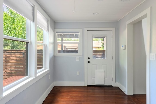 1309 Garden St, Austin, TX 78702 - entryway with dark wood-type flooring and baseboards