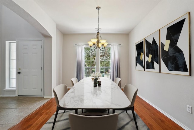 411 S Lynnwood Trl, Cedar Park, TX 78613 - dining area with a chandelier and wood finished floors