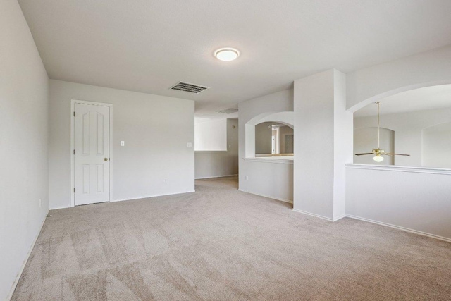 411 S Lynnwood Trl, Cedar Park, TX 78613 - empty room with a ceiling fan, carpet flooring, and arched walkways