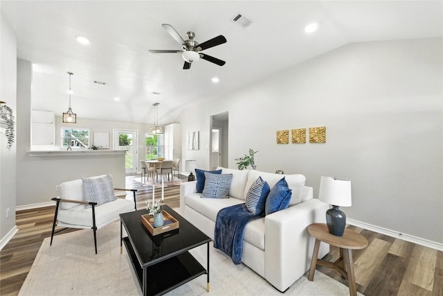 118 W Pauwela Ln, Bastrop, TX 78602 - living room with vaulted ceiling, light wood-type flooring, ceiling fan, and recessed lighting