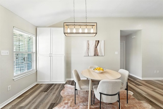 118 W Pauwela Ln, Bastrop, TX 78602 - dining area featuring wood finished floors, healthy amount of natural light, and vaulted ceiling