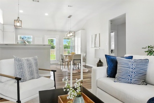 118 W Pauwela Ln, Bastrop, TX 78602 - living area featuring wood finished floors and recessed lighting