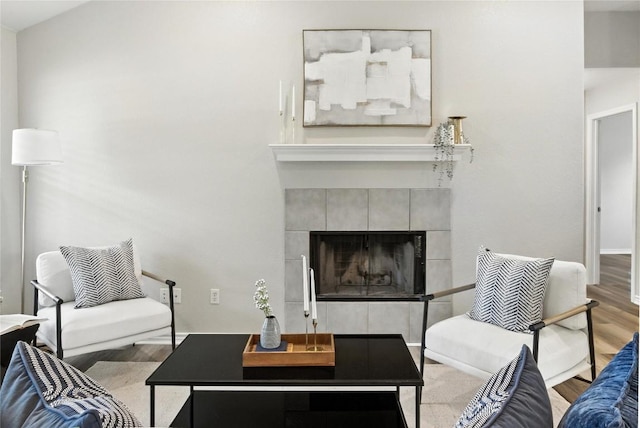 118 W Pauwela Ln, Bastrop, TX 78602 - living area with a fireplace and wood finished floors