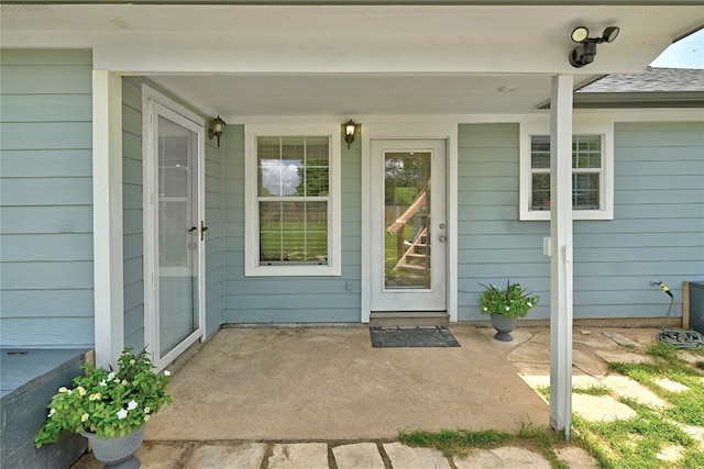 118 W Pauwela Ln, Bastrop, TX 78602 - view of exterior entry with a patio area