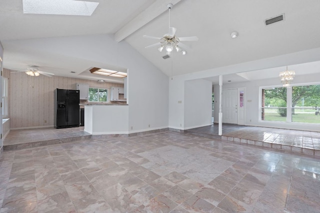 11511 Sombrero Dr, Austin, TX 78748 - unfurnished living room featuring ceiling fan and a skylight