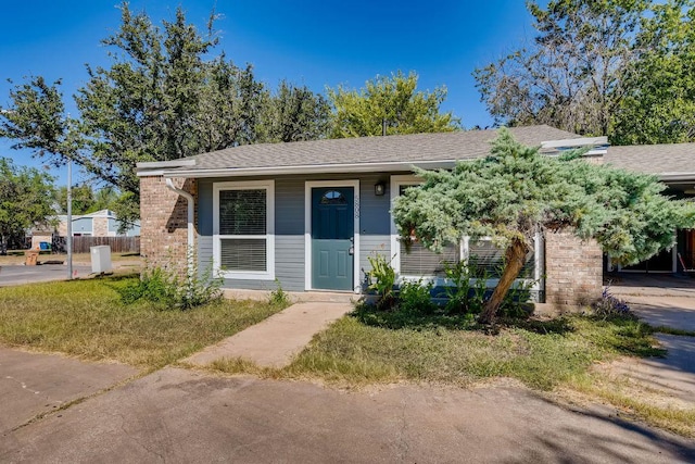 5808 Cherry Park, Austin, TX 78745 - view of front of house with roof with shingles