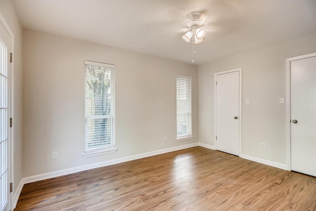 5808 Cherry Park, Austin, TX 78745 - spare room with wood finished floors and a ceiling fan