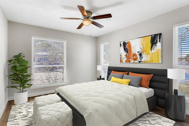 5808 Cherry Park, Austin, TX 78745 - bedroom featuring wood finished floors and ceiling fan