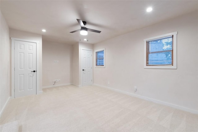 318 W Hackberry St, Fredericksburg, TX 78624 - empty room featuring light colored carpet, a ceiling fan, and recessed lighting