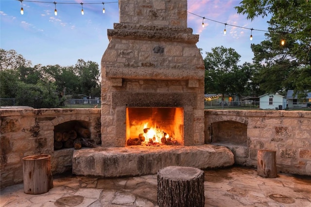 318 W Hackberry St, Fredericksburg, TX 78624 - view of patio with an outdoor stone fireplace