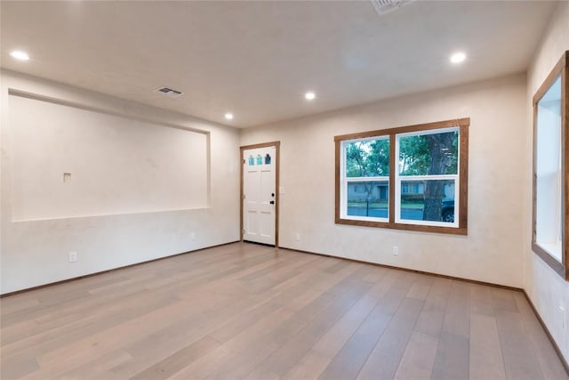 318 W Hackberry St, Fredericksburg, TX 78624 - unfurnished room with wood finished floors and recessed lighting