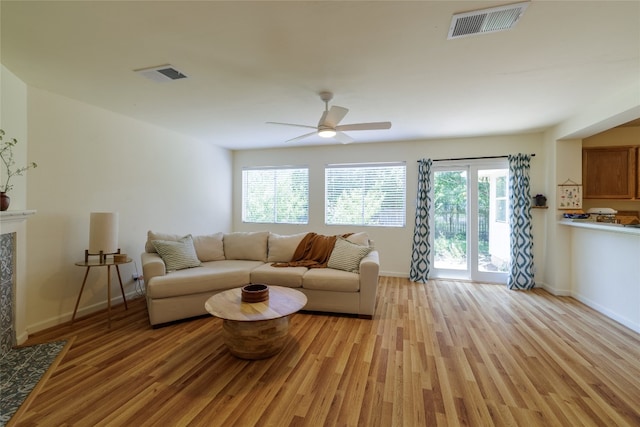 16704 Shipshaw River Cv, Leander, TX 78641 - living area featuring light wood-style floors and a ceiling fan