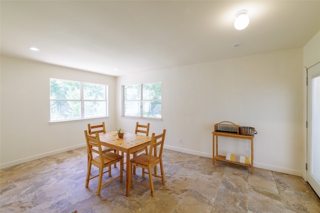 16704 Shipshaw River Cv, Leander, TX 78641 - dining area featuring stone finish flooring and baseboards