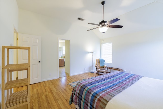 16704 Shipshaw River Cv, Leander, TX 78641 - bedroom with light wood-style flooring, lofted ceiling, ceiling fan, and ensuite bathroom