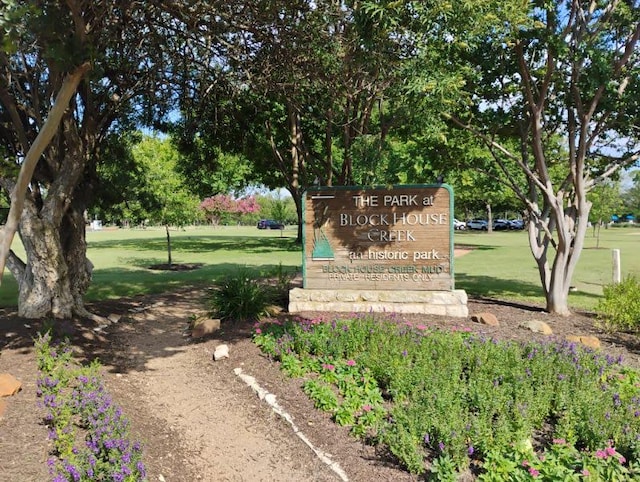 16704 Shipshaw River Cv, Leander, TX 78641 - community / neighborhood sign featuring a yard