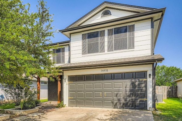 14418 Cummins Way, Manor, TX 78653 - view of front facade featuring a garage and driveway
