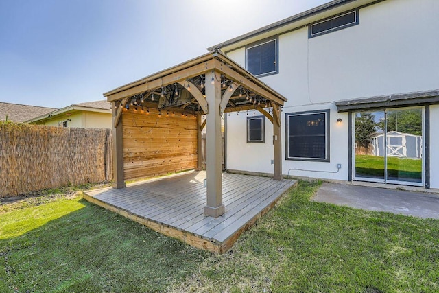 14418 Cummins Way, Manor, TX 78653 - wooden deck with a storage unit and a gazebo