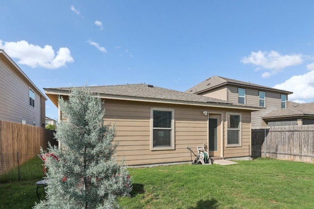 13605 Abigail Adams St, Manor, TX 78653 - back of property featuring a fenced backyard