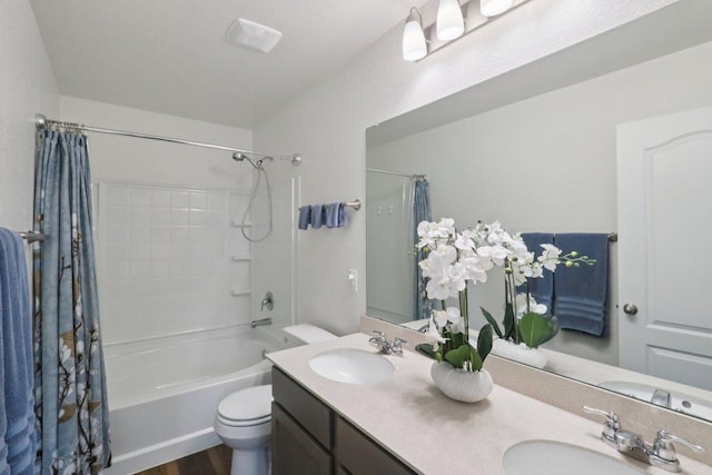 13605 Abigail Adams St, Manor, TX 78653 - bathroom with shower / tub combo with curtain, double vanity, and wood finished floors