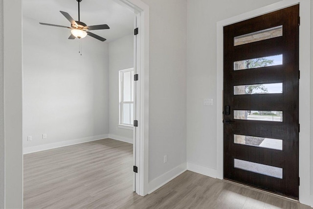 5126 Destination Way, Jonestown, TX 78645 - entrance foyer with wood finished floors and a ceiling fan