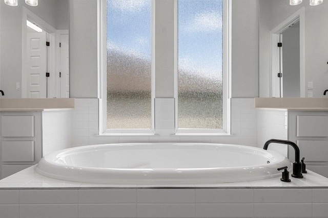 5126 Destination Way, Jonestown, TX 78645 - full bathroom with a bath and plenty of natural light