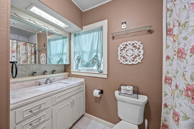 707 Wilson St, Taylor, TX 76574 - full bath featuring vanity, tile patterned floors, crown molding, and curtained shower