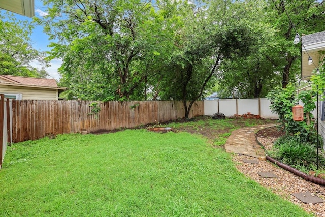 707 Wilson St, Taylor, TX 76574 - view of fenced backyard