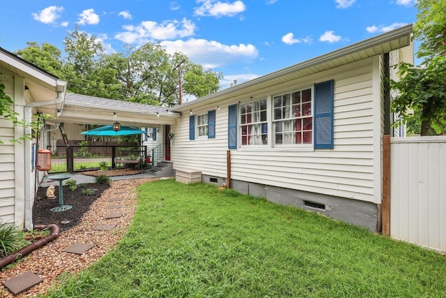 707 Wilson St, Taylor, TX 76574 - view of side of property featuring crawl space and entry steps