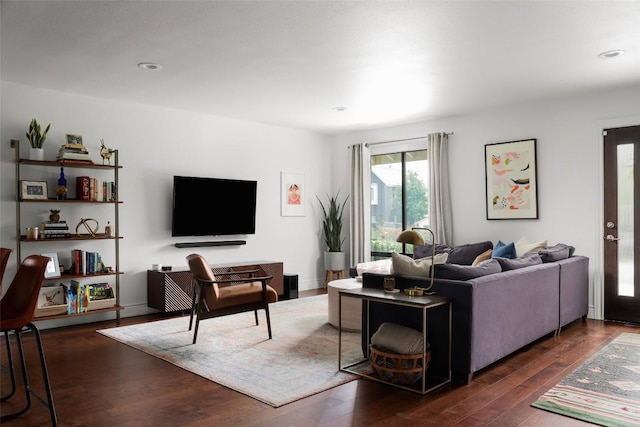 5710 Marilyn Dr, Austin, TX 78757 - living area with dark wood-style flooring and recessed lighting