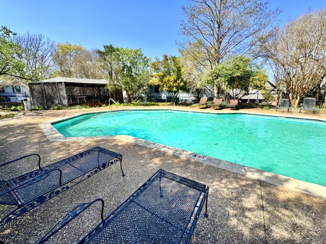 1411 Gracy Farms Ln Unit 130, Austin, TX 78758 - community pool with a patio