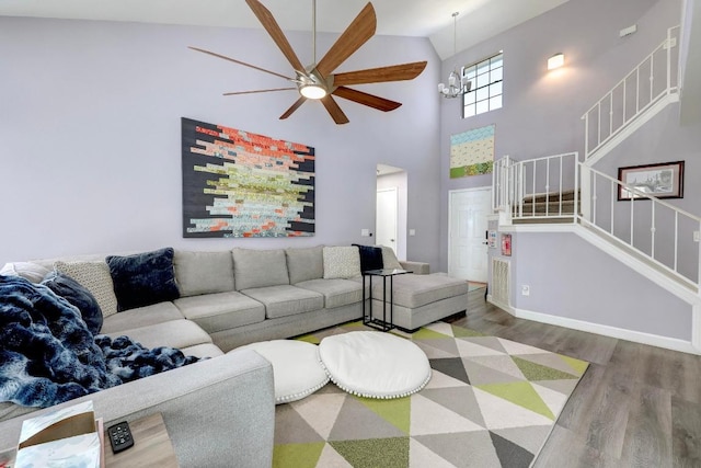402 Oakcrest Dr, Cedar Park, TX 78613 - living area with ceiling fan, high vaulted ceiling, wood finished floors, and stairway