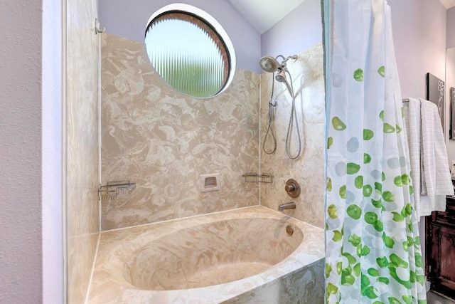 402 Oakcrest Dr, Cedar Park, TX 78613 - full bath featuring a combined bath / shower with marble appearance and lofted ceiling