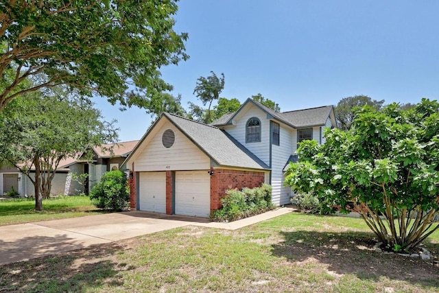 402 Oakcrest Dr, Cedar Park, TX 78613 - traditional-style home with a garage, brick siding, concrete driveway, and a front yard