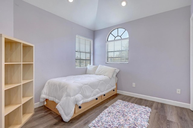 402 Oakcrest Dr, Cedar Park, TX 78613 - bedroom with wood finished floors, recessed lighting, and lofted ceiling