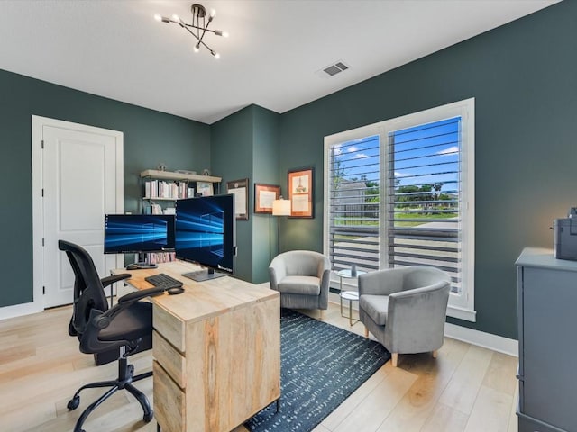 11901 Pier Ct, Austin, TX 78737 - office area featuring light wood-style floors and a chandelier