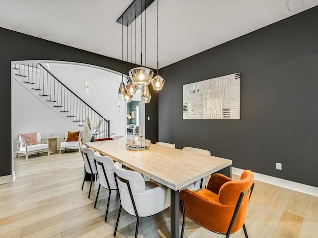 11901 Pier Ct, Austin, TX 78737 - dining area featuring stairway, light wood-style floors, and a chandelier