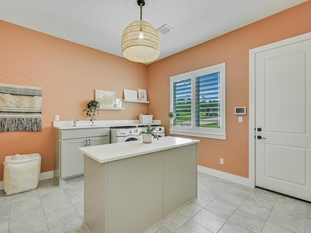 11901 Pier Ct, Austin, TX 78737 - home office featuring washer / clothes dryer and light tile patterned floors