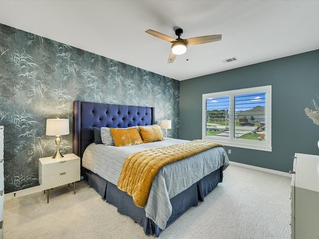 11901 Pier Ct, Austin, TX 78737 - bedroom featuring wallpapered walls, an accent wall, carpet, and a ceiling fan