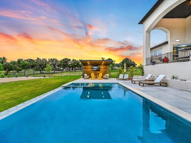 11901 Pier Ct, Austin, TX 78737 - pool at dusk with a patio and a pool with connected hot tub