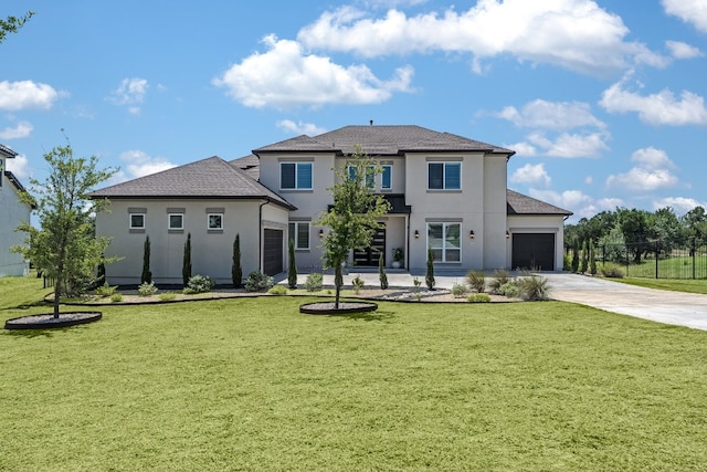 11901 Pier Ct, Austin, TX 78737 - back of property featuring driveway, an attached garage, stucco siding, and roof with shingles