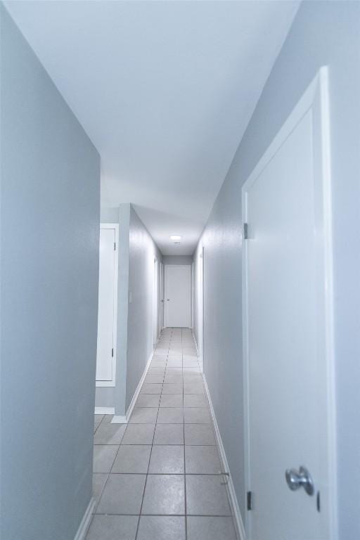 7107 Dan Jean Dr Unit A & B, Austin, TX 78745 - hall with light tile patterned floors and baseboards