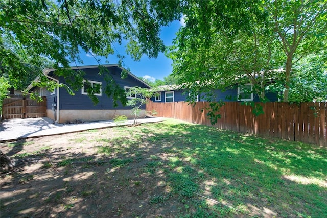 7107 Dan Jean Dr Unit A & B, Austin, TX 78745 - view of yard featuring a patio