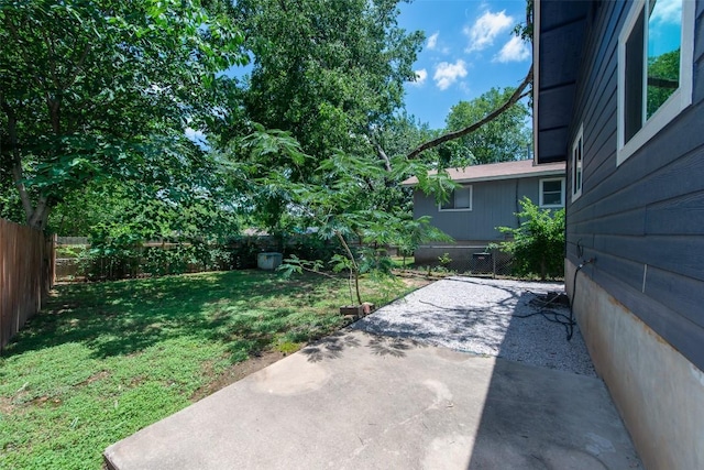 7107 Dan Jean Dr Unit A & B, Austin, TX 78745 - fenced backyard featuring a patio